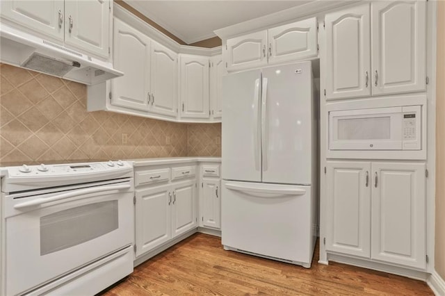 5428 W 145th Ter, Leawood, KS 66224 - kitchen featuring white appliances, under cabinet range hood, white cabinetry, and light countertops