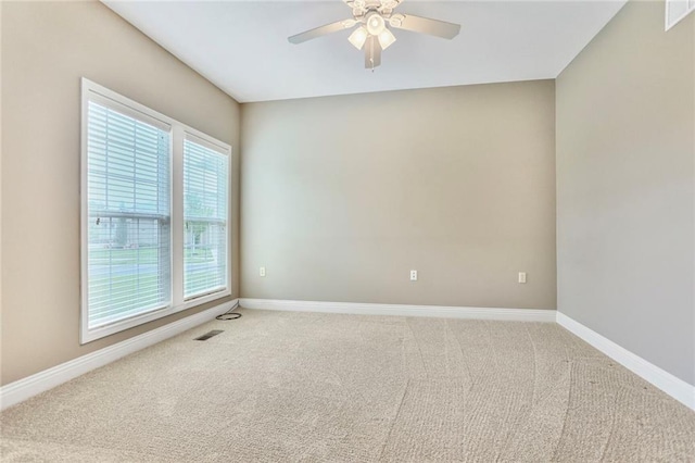 5428 W 145th Ter, Leawood, KS 66224 - carpeted spare room featuring ceiling fan and baseboards