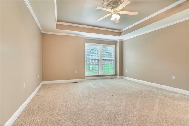 5428 W 145th Ter, Leawood, KS 66224 - empty room featuring a tray ceiling, crown molding, a ceiling fan, light carpet, and baseboards