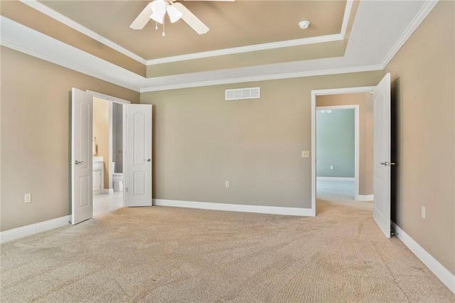 5428 W 145th Ter, Leawood, KS 66224 - unfurnished bedroom with a raised ceiling, light carpet, ornamental molding, and baseboards