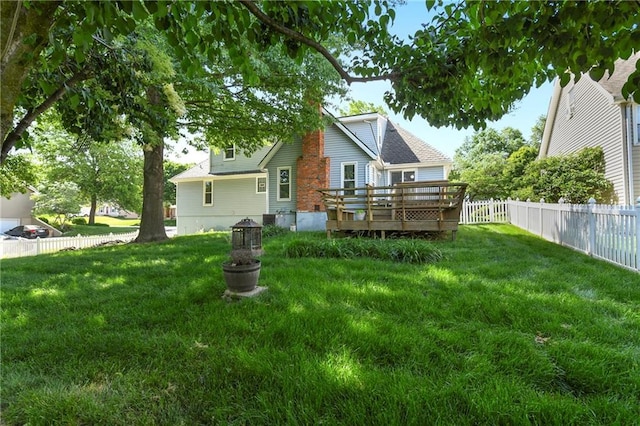 back of property featuring a wooden deck