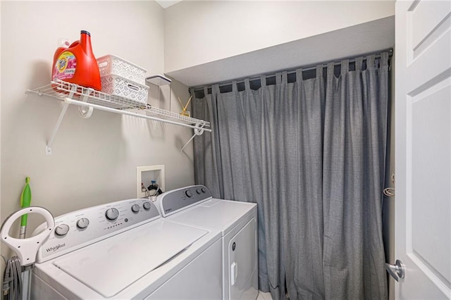 laundry area featuring laundry area and washing machine and dryer