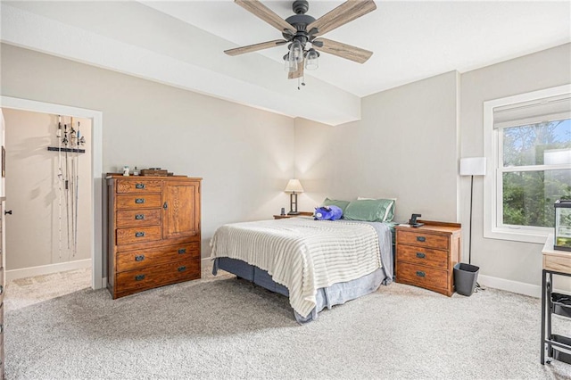 bedroom with baseboards, carpet, and ceiling fan