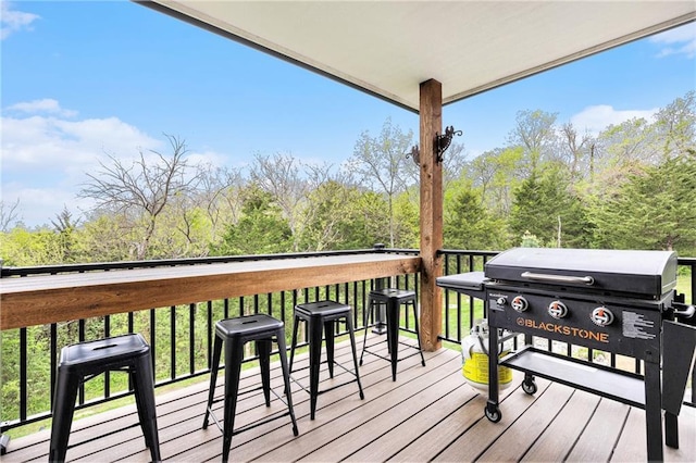 wooden terrace with grilling area