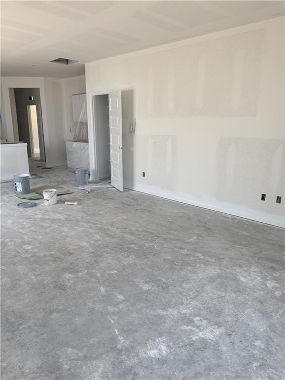 2107 Brook Ridge Cir, Tonganoxie, KS 66086 - unfurnished living room featuring unfinished concrete floors