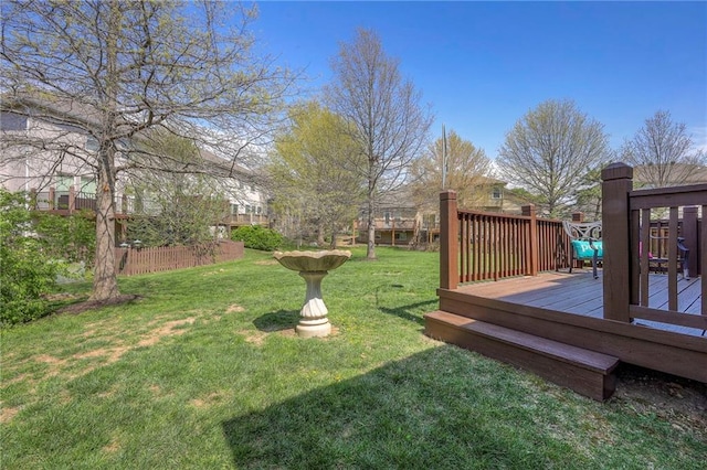 view of yard featuring a deck