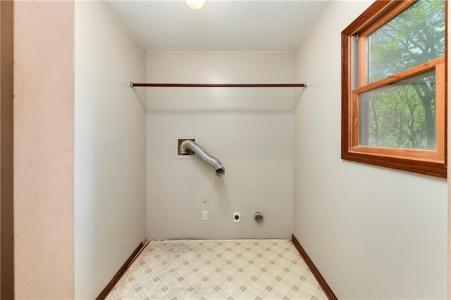 32832 195th St, Leavenworth, KS 66048 - laundry room with hookup for an electric dryer, tile patterned floors, and hookup for a washing machine