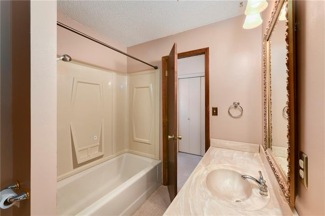 32832 195th St, Leavenworth, KS 66048 - bathroom featuring a textured ceiling, shower / washtub combination, and vanity