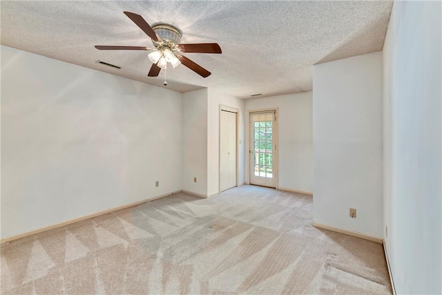 32832 195th St, Leavenworth, KS 66048 - carpeted empty room featuring a ceiling fan, a textured ceiling, and baseboards