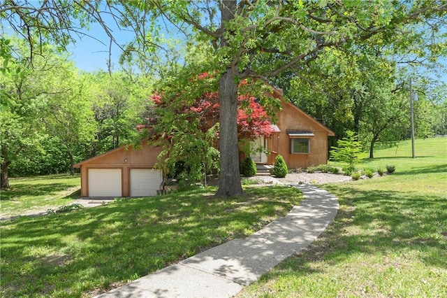 32832 195th St, Leavenworth, KS 66048 - view of property hidden behind natural elements with a garage and a front lawn