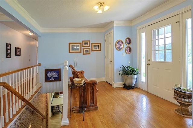 15404 NE 181st St, Holt, MO 64048 - entryway with light wood finished floors, crown molding, and baseboards