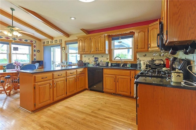 15404 NE 181st St, Holt, MO 64048 - kitchen with dishwasher, a sink, a peninsula, and light wood-type flooring