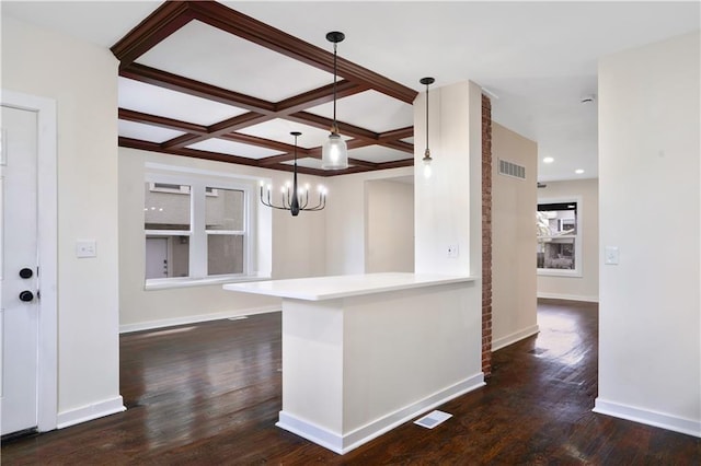 3009 Campbell St, Kansas City, MO 64109 - kitchen with dark wood-type flooring, visible vents, baseboards, and a chandelier