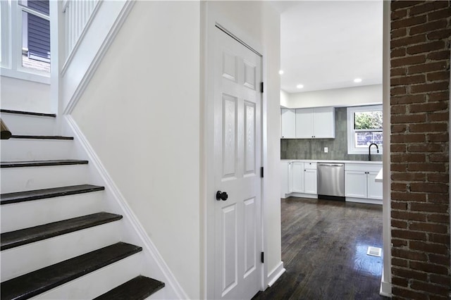 3009 Campbell St, Kansas City, MO 64109 - stairway with recessed lighting and wood finished floors