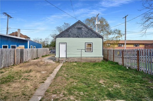 3009 Campbell St, Kansas City, MO 64109 - exterior space featuring fence private yard