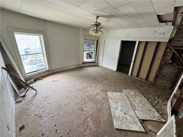 1353 SW Western Ave, Topeka, KS 66604 - unfurnished living room featuring ceiling fan
