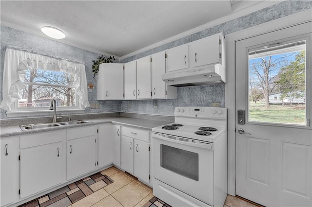 kitchen featuring electric range, a textured ceiling, white cabinets, under cabinet range hood, and a sink