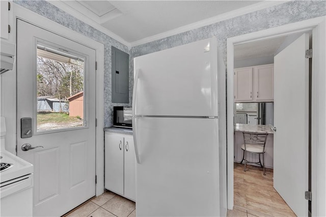 interior space featuring range with electric cooktop, electric panel, freestanding refrigerator, crown molding, and black microwave