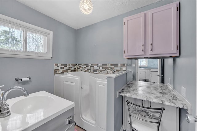 washroom featuring a sink