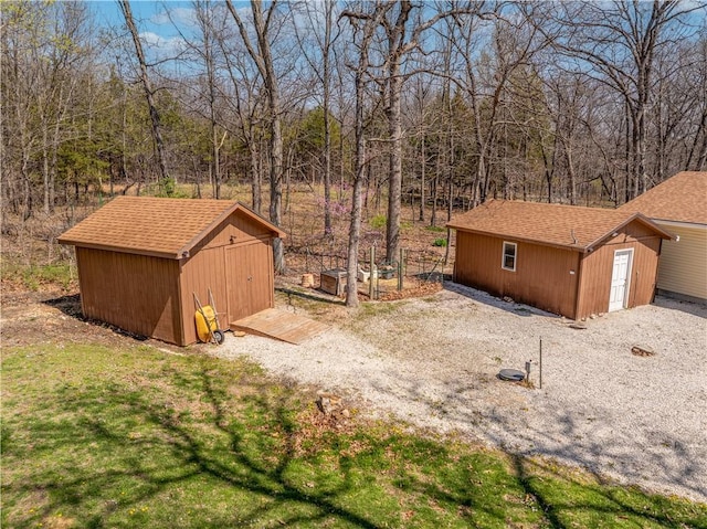 exterior space with a shed and an outdoor structure