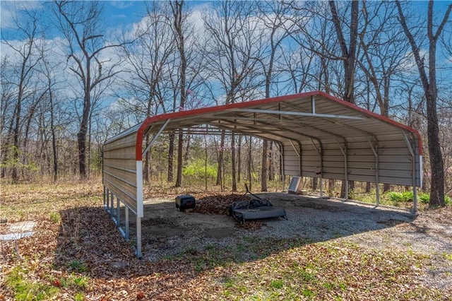 view of parking / parking lot with a carport