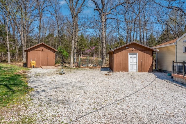 view of yard with an outbuilding and a storage unit