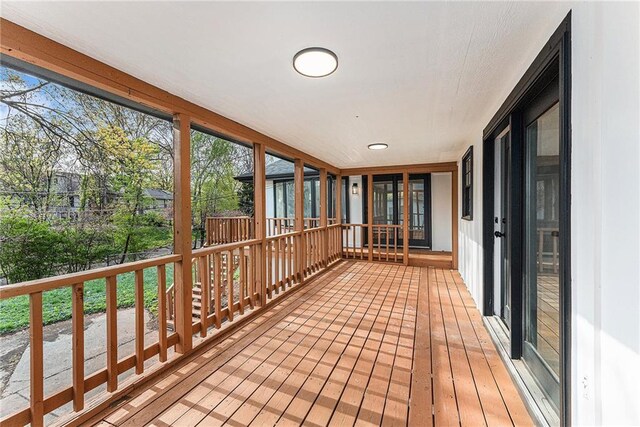 710 N Redwood Dr, Independence, MO 64056 - view of unfurnished sunroom