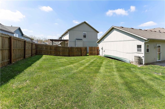 view of yard with a fenced backyard