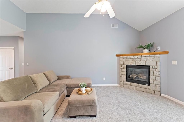 carpeted living area with ceiling fan, a fireplace, visible vents, lofted ceiling, and baseboards