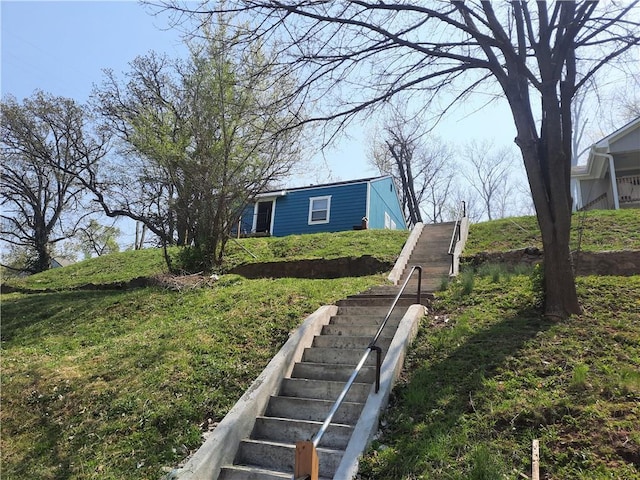 view of yard featuring stairway