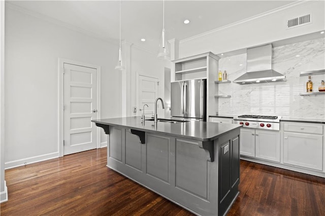 4924 Central St, Kansas City, MO 64112 - kitchen with open shelves, wall chimney range hood, stainless steel appliances, and a sink
