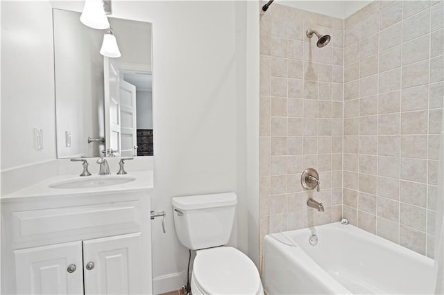 4924 Central St, Kansas City, MO 64112 - bathroom with toilet, vanity, and shower / bath combination