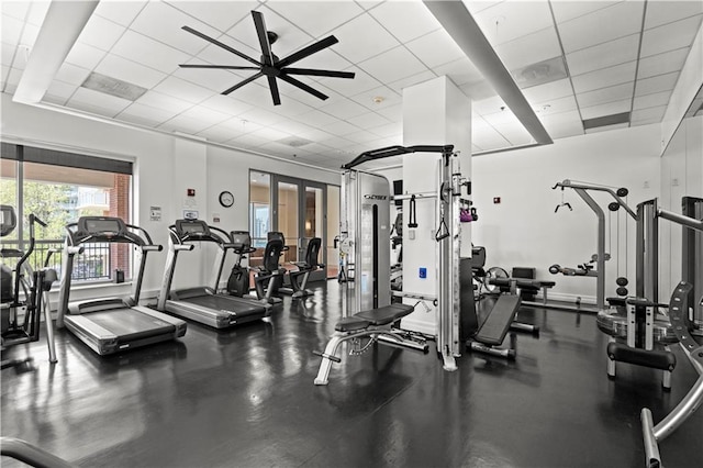 4924 Central St, Kansas City, MO 64112 - workout area with a paneled ceiling, a ceiling fan, and baseboards
