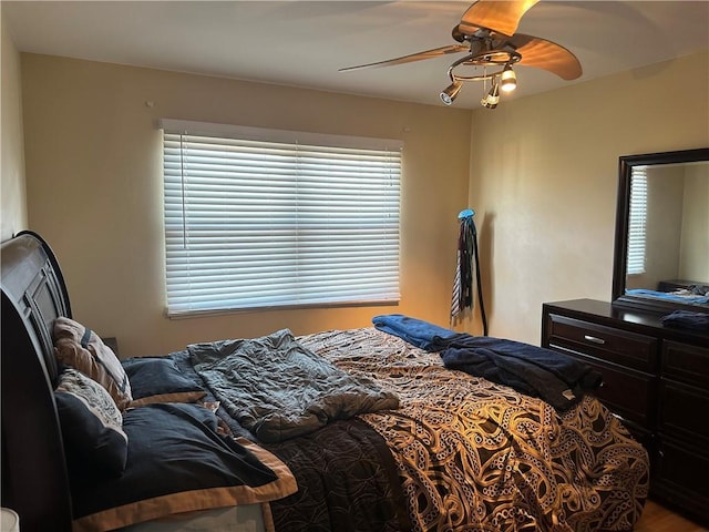 4209 Clark Ave Unit 4209-4, Kansas City, MO 64111 - bedroom with ceiling fan
