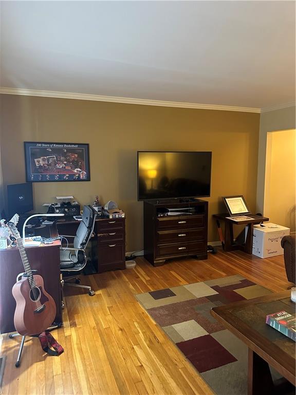 4209 Clark Ave Unit 4209-4, Kansas City, MO 64111 - office area with crown molding and wood-type flooring