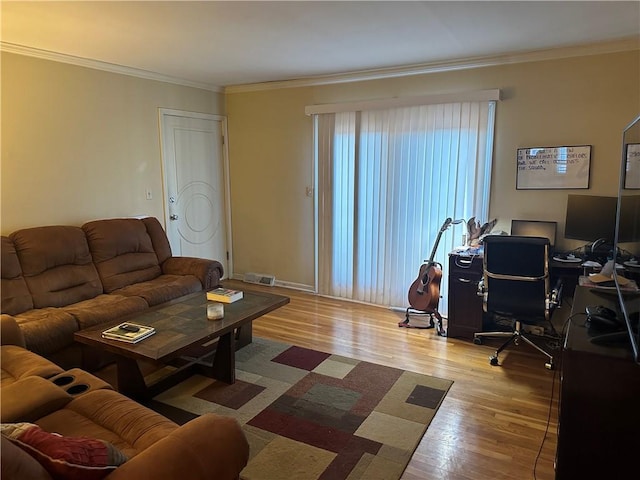 4209 Clark Ave Unit 4209-4, Kansas City, MO 64111 - living area with crown molding, wood finished floors, and visible vents