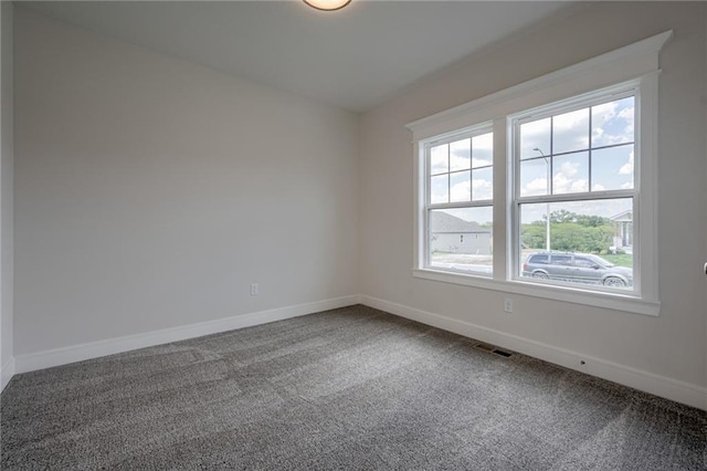 8216 NW 89th Ter, Kansas City, MO 64153 - empty room featuring carpet flooring and baseboards