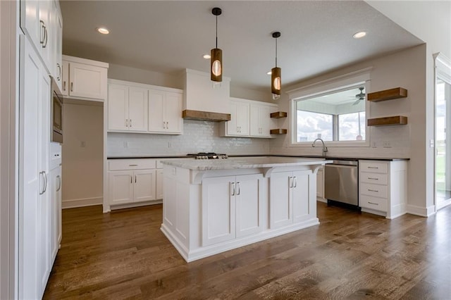 8216 NW 89th Ter, Kansas City, MO 64153 - kitchen with custom exhaust hood, tasteful backsplash, white cabinets, open shelves, and stainless steel appliances