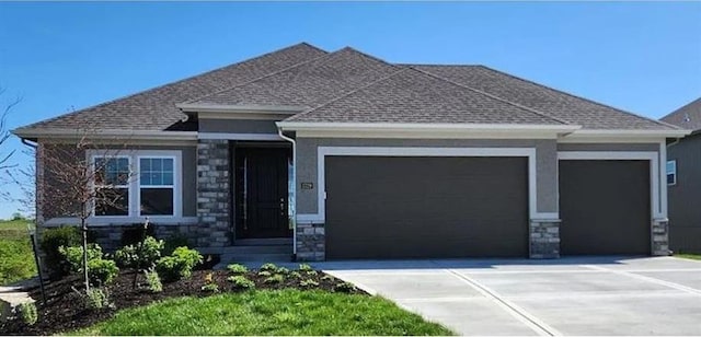 8216 NW 89th Ter, Kansas City, MO 64153 - view of front of home featuring an attached garage, stone siding, and concrete driveway