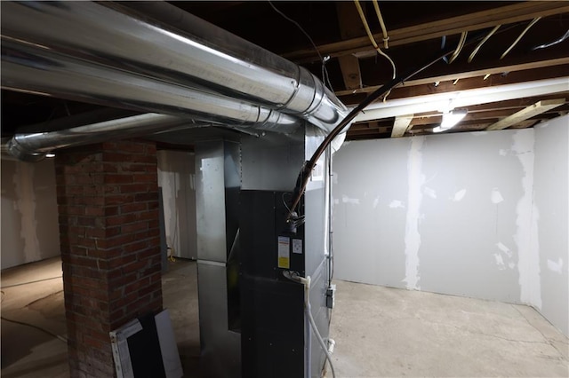 5606 N Indiana Ave, Kansas City, MO 64119 - unfinished below grade area featuring heating unit