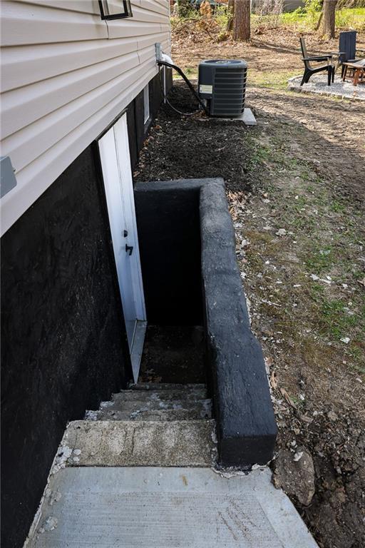 5606 N Indiana Ave, Kansas City, MO 64119 - entry to storm shelter featuring cooling unit