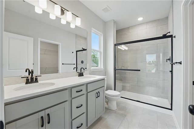 2433 NW Sunnyvale Ct, Blue Springs, MO 64015 - bathroom with a stall shower, double vanity, toilet, marble look tiles, and recessed lighting