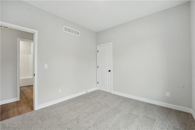 2433 NW Sunnyvale Ct, Blue Springs, MO 64015 - carpeted spare room with baseboards