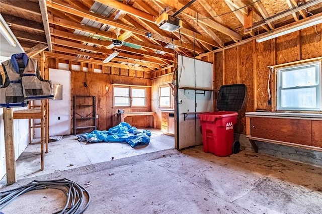 misc room with a garage