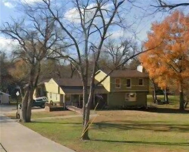 1148 S 53rd St, Kansas City, KS 66106 - view of front of house featuring a front yard