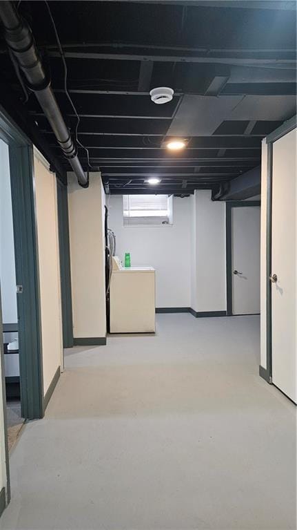 below grade area featuring washer / clothes dryer