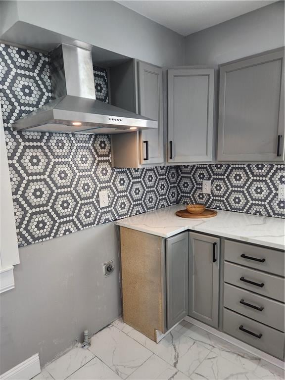 washroom featuring marble finish floor