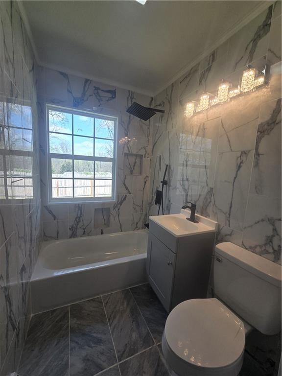 full bathroom featuring toilet, tile walls, vanity, shower / bathtub combination, and marble finish floor