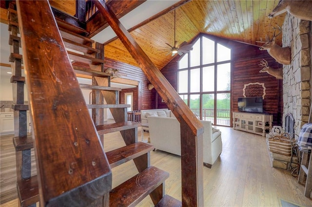 43 901st Rd, Clinton, MO 64735 - stairs with wood ceiling, a healthy amount of sunlight, high vaulted ceiling, and wood finished floors