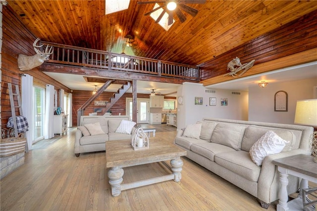 43 901st Rd, Clinton, MO 64735 - living area with stairway, visible vents, wood-type flooring, and a ceiling fan